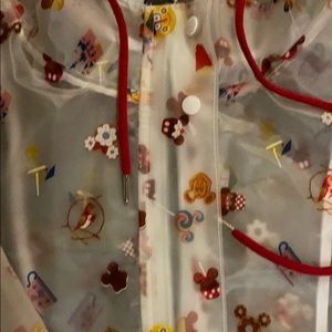 NWT- Disneyland signature rain coat size large